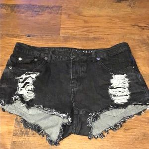 Black ripped shorts